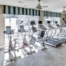 Cutting-edge amenities at your fingertips a gym with exercise equipment